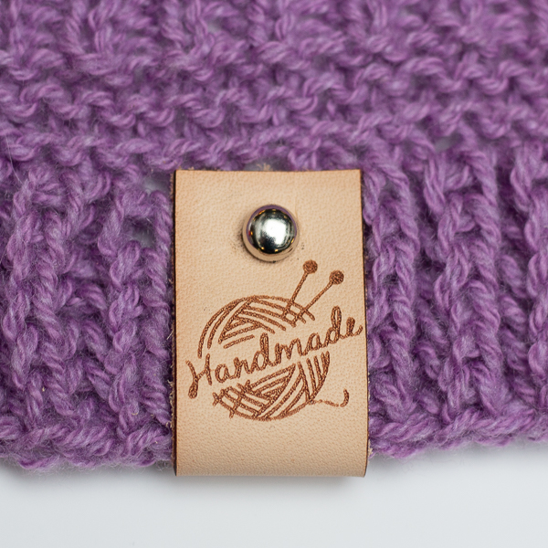 Handmade-merkki nahkaa taitettava niitillä