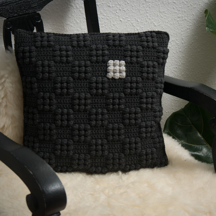 [Y7350060] Kuplaruudullinen tyyny  | Hjertegarn Tilbehör 94-5 ohje